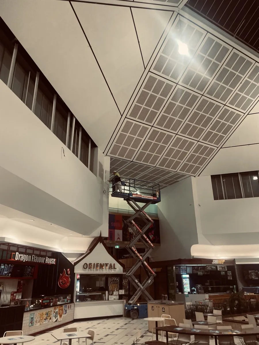 Commercial interior — scissor lift work